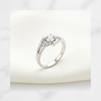 ZARISHA Delicate Wave Solitaire Ring with Side Accents
